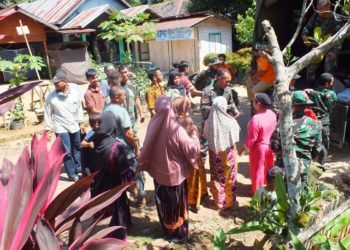 Satgas TMMD Pamitan Dengan Warga