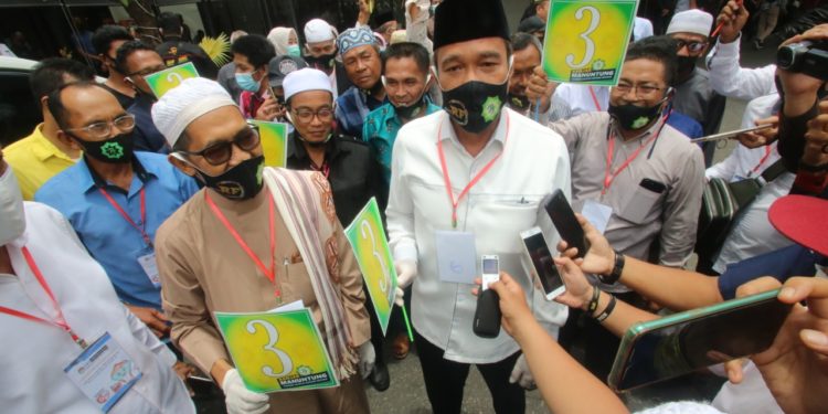 Pasangan H Rusli – KH Fadlan Asy’ari Dapat Nomor 3