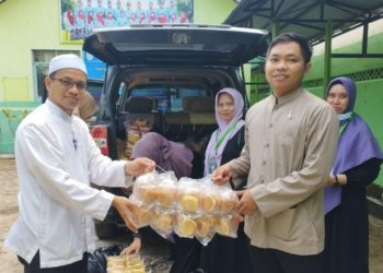 Pawai Tahun Baru Islam, Forum Silaturahmi Ustadz Ustadzah Kabupaten Banjar Bagikan Ribuan Roti