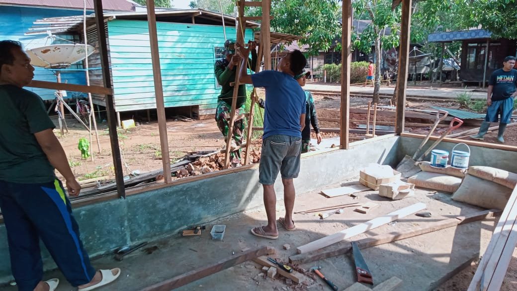 Kejar Target, Anggota Satgas TMMD Selesaikan Pekerjaan Tepat Waktu