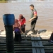 Hanya Ada Jalur Air, Babinsa Bantu Anak Sekolah Seberangi Sungai