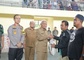 Bupati Asahan Serahkan Bantuan Beras