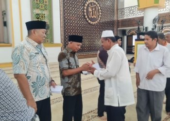 BKM Agung Achmad Bakrie Kisaran dan Bupati Asahan Salurkan Bantuan Kepada Anak Yatim dan Abang Becak