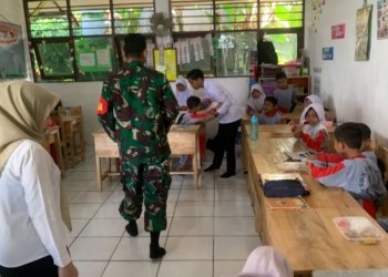 TNI dan Sekolah Bersinergi, Babinsa Kodim 1006/Banjar Salurkan Ribuan Paket Nutrisi Bergizi