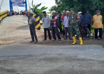 Babinsa Sungai Batang Ilir Hadiri Syukuran Jembatan Gantung, Wujud Dukungan TNI untuk Pembangunan Desa