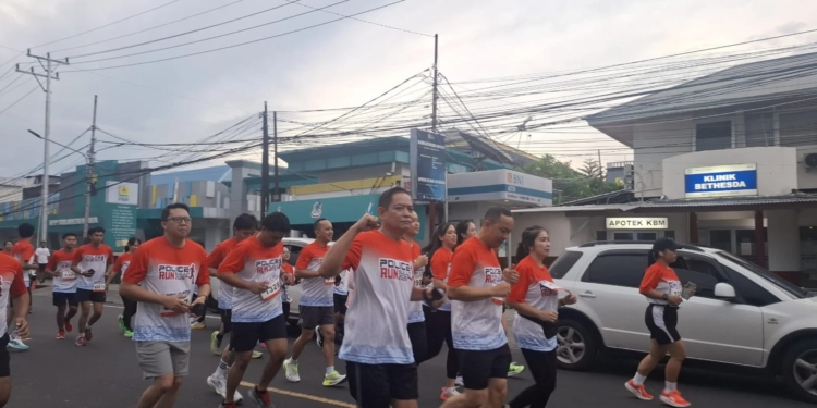 Kopolres Bitung Pimpin Kontingen Polres di Police Run 5K 2026 Polda Sulut