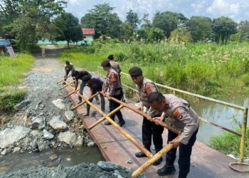 Polres Tanah Bumbu Dukung Pembangunan Jembatan di Tungkaran Pangeran untuk Tingkatkan Akses Masyarakat